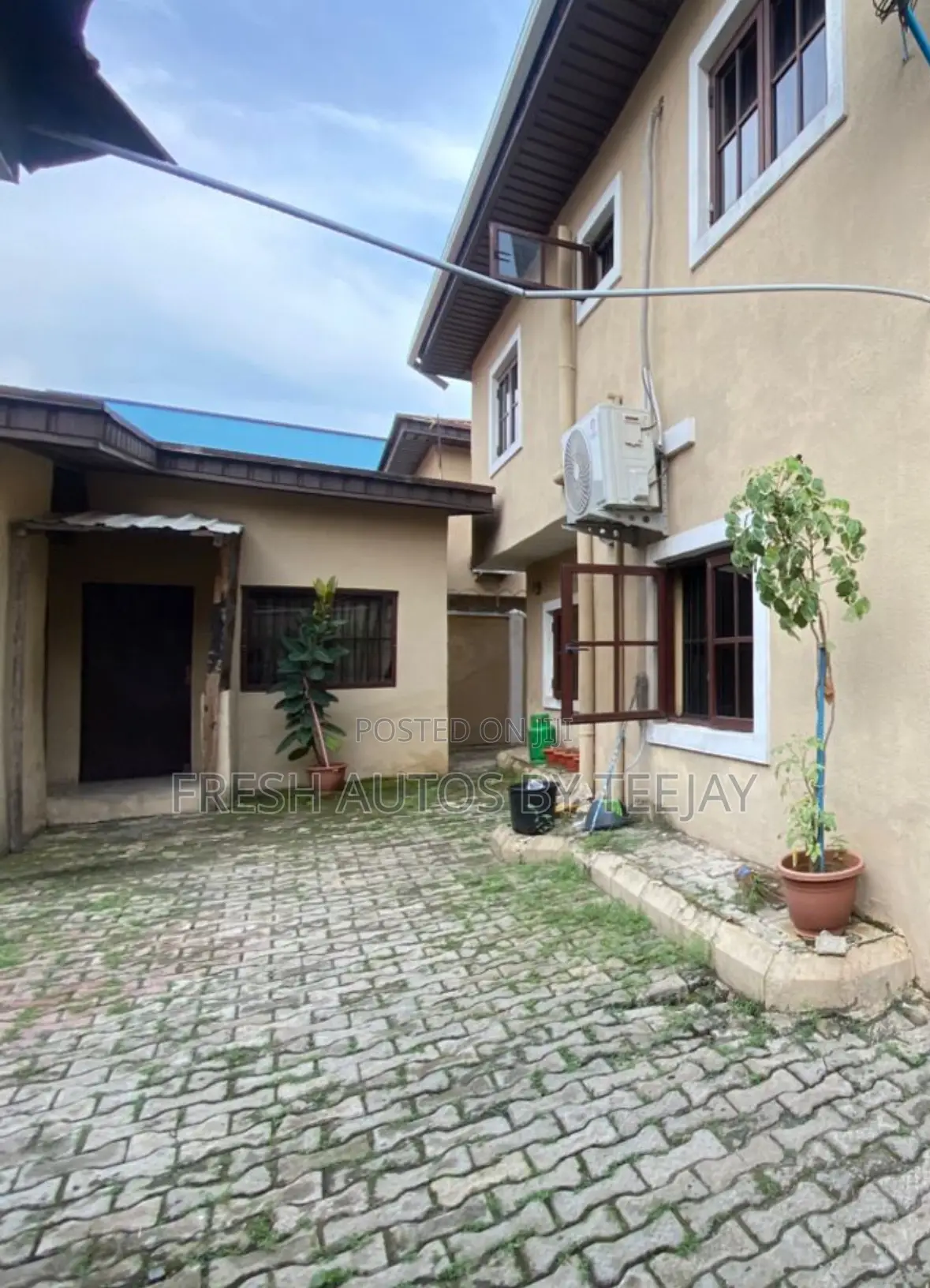 A Gated Table Land With Old Structure in Omole Phase2 Estate