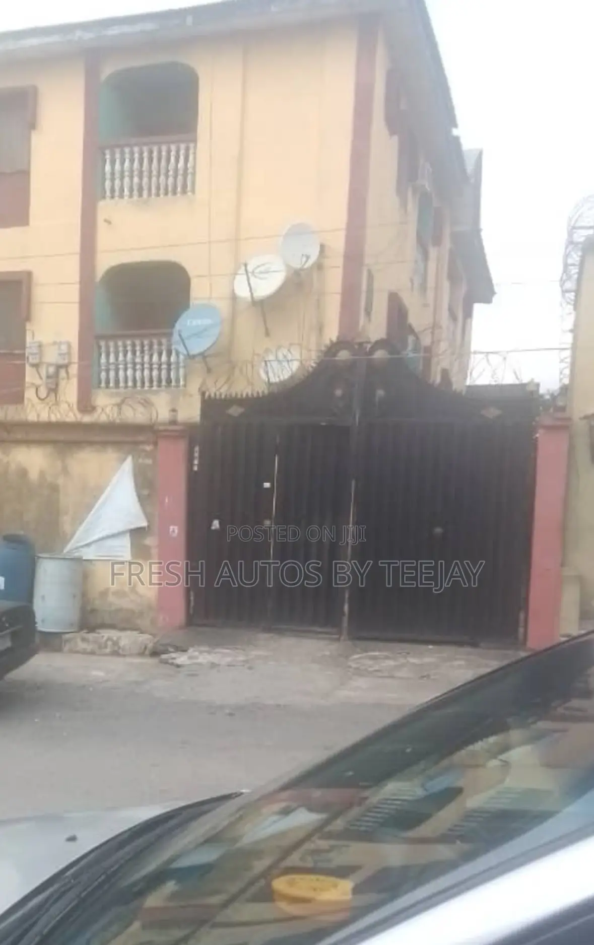 A Gated Land With Old Structure Along Isheri Road Magodo