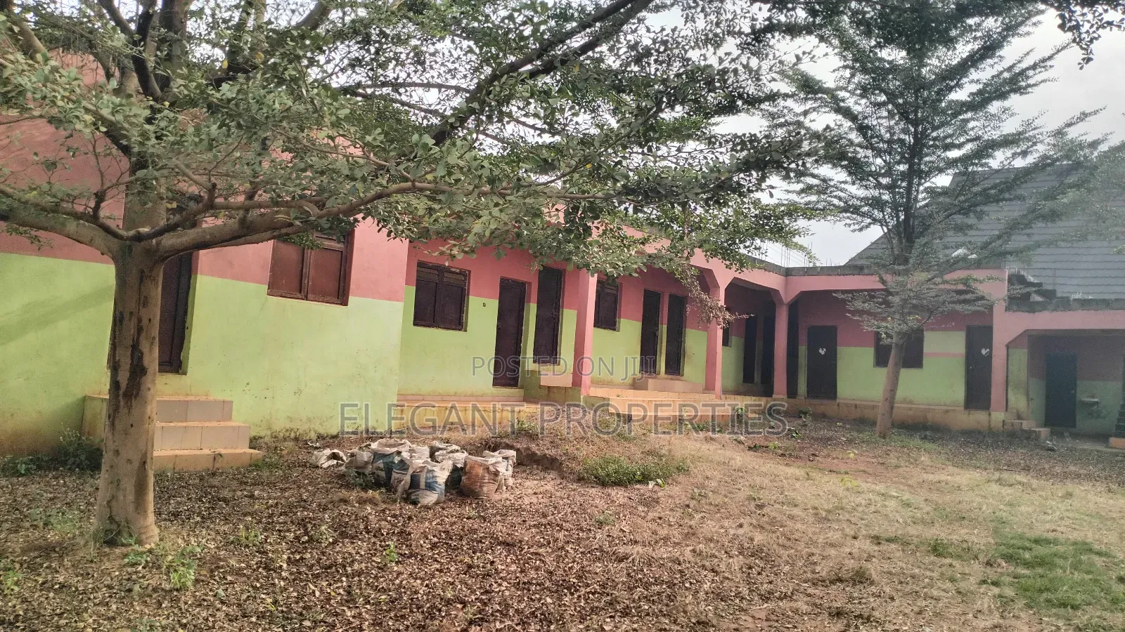 An Uncompleted Deckened Structure of 12 Rooms and 4 Toilets.