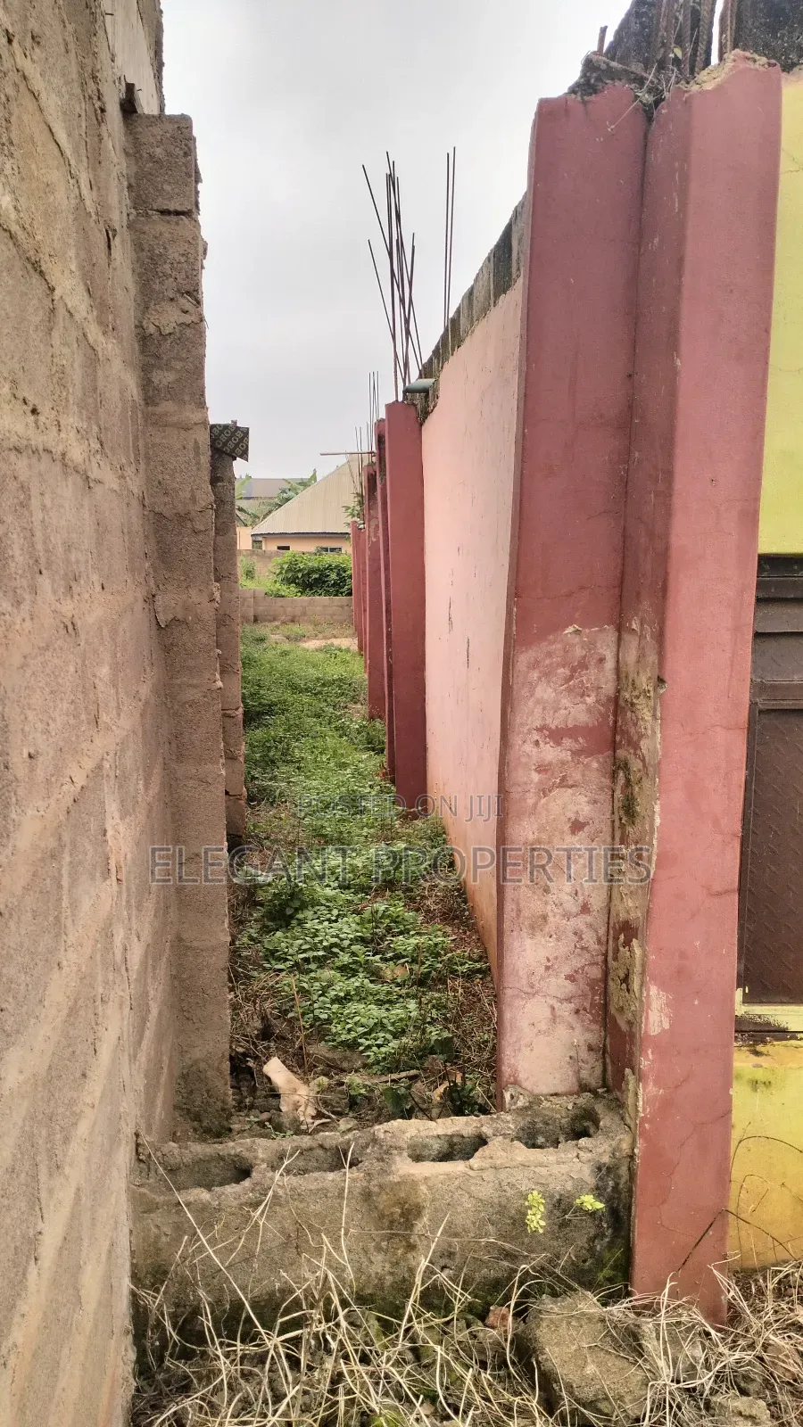 An Uncompleted Deckened Structure of 12 Rooms and 4 Toilets.