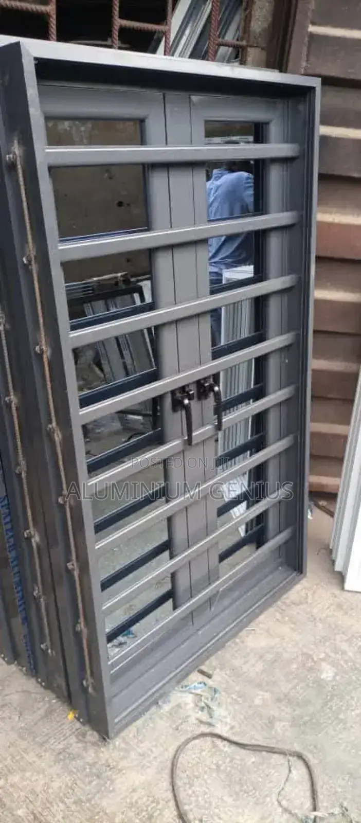 Gray Casement Windows With Burglary and Net