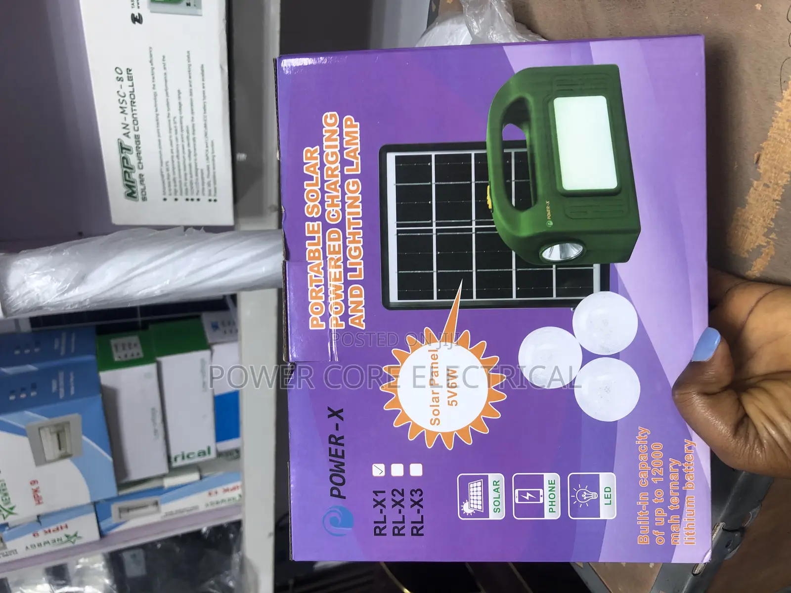 Portable Solar Powered Charging and Lighting Lamp