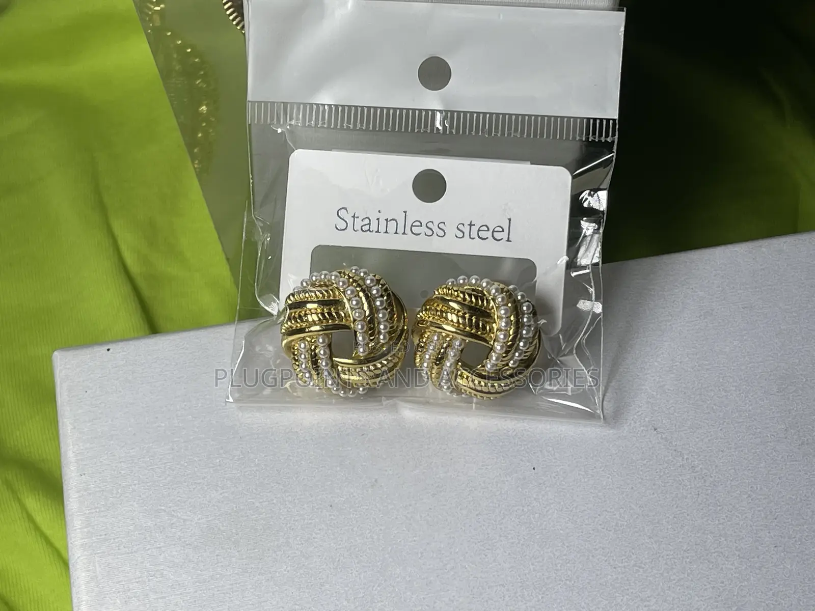 Round Twisted White Pearl and Gold Steel Embellished Earrings