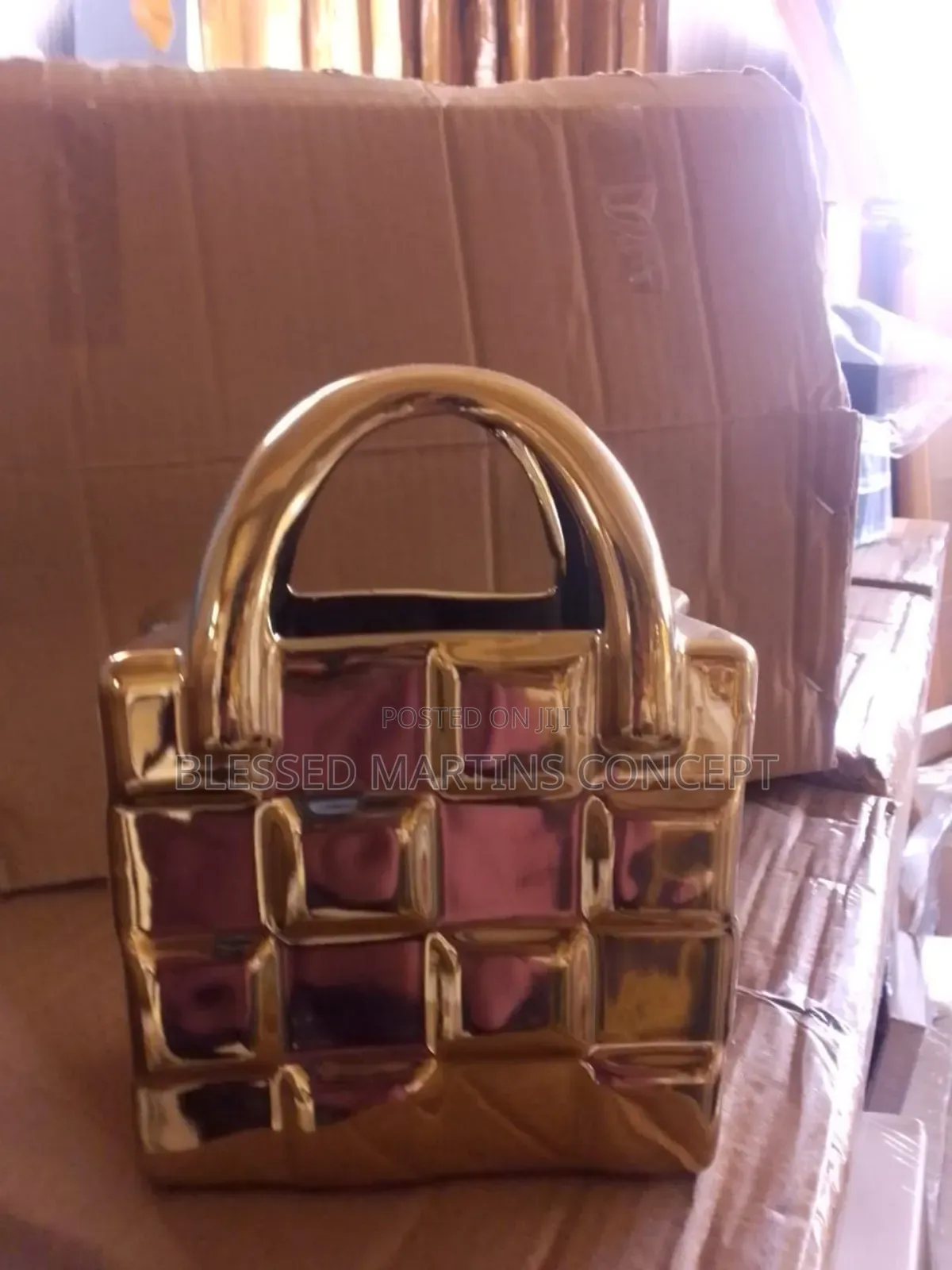 This Is a Gold Ceramic Handbag-Shaped Vase or Decorative Ornamen