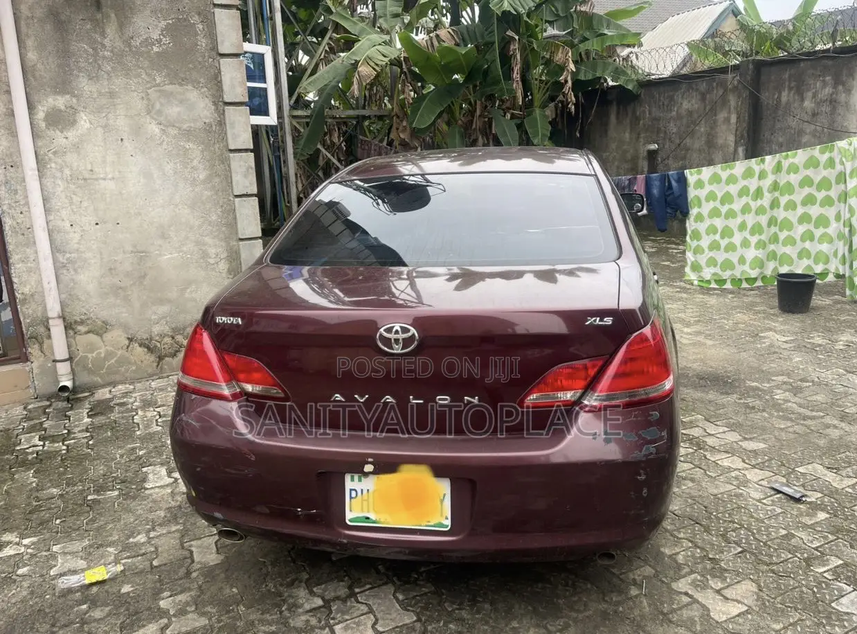 Toyota Avalon XLS Sedan FWD (3.5L 6cyl 6A) 2009 Red