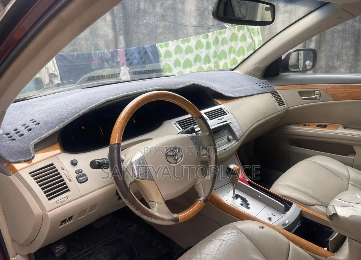 Toyota Avalon XLS Sedan FWD (3.5L 6cyl 6A) 2009 Red