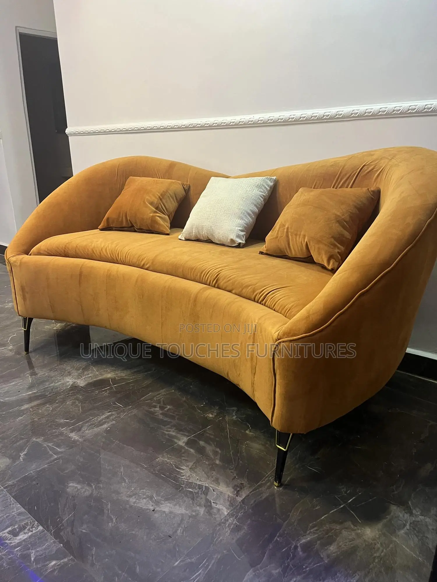 Curvy Orange Sofa for Ante Room