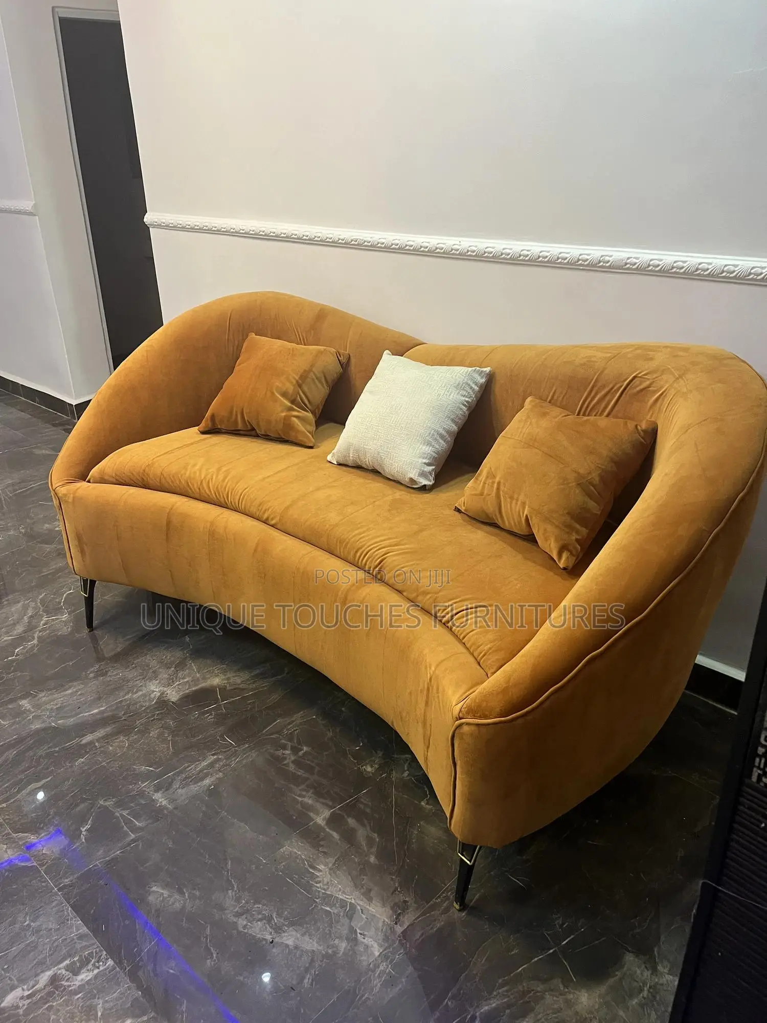 Curvy Orange Sofa for Ante Room