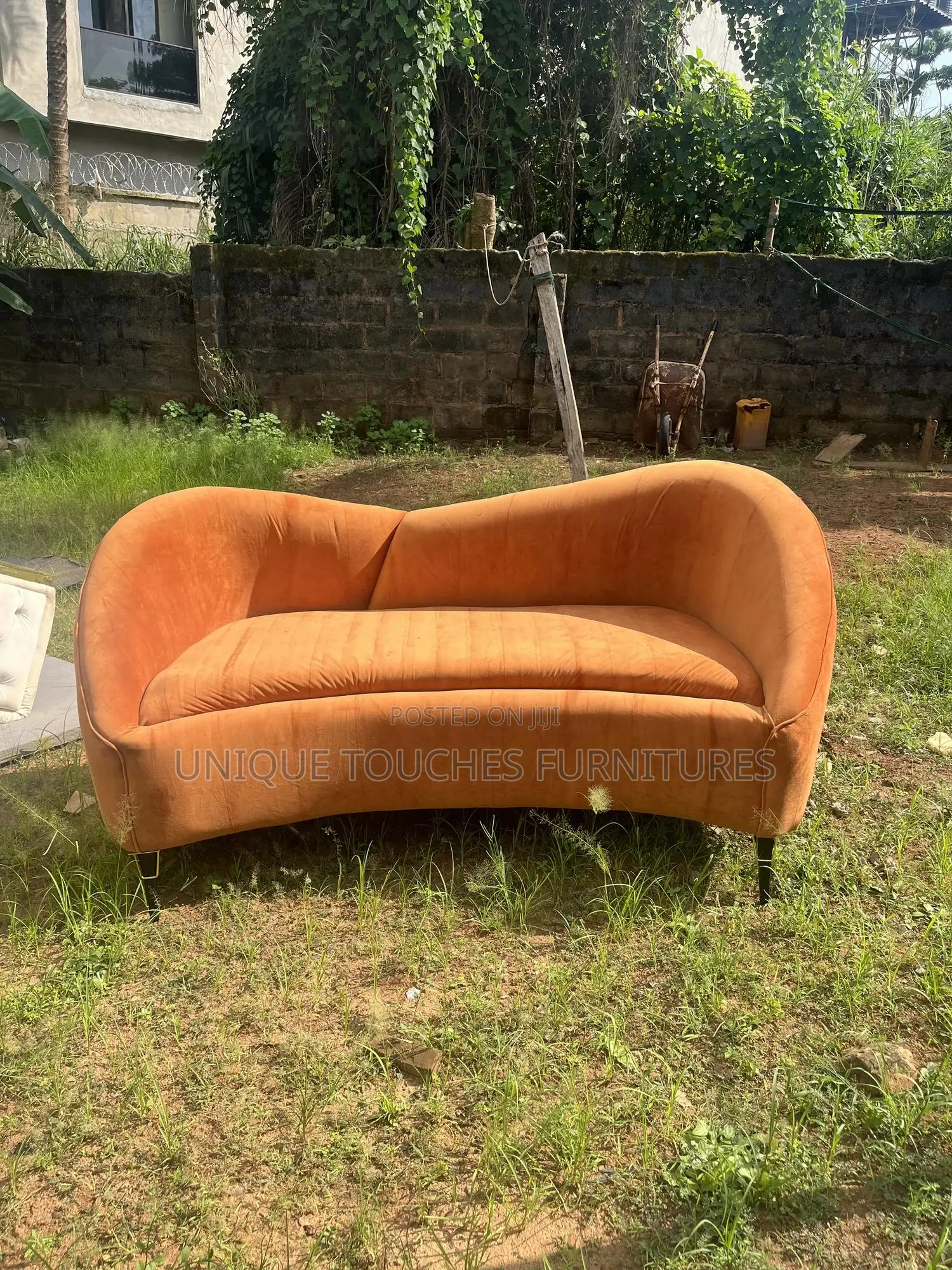Curvy Orange Sofa for Ante Room