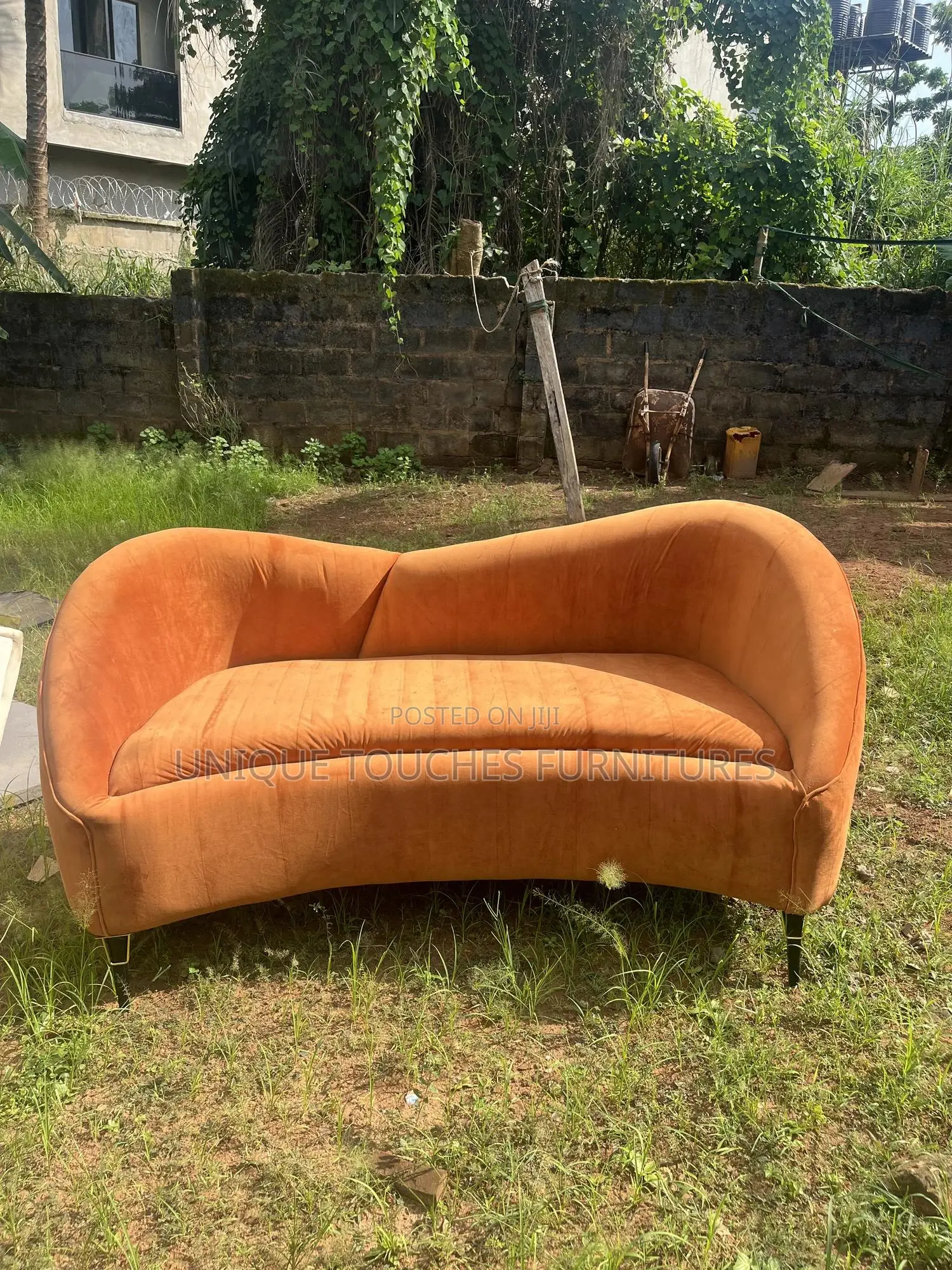 Curvy Orange Sofa for Ante Room