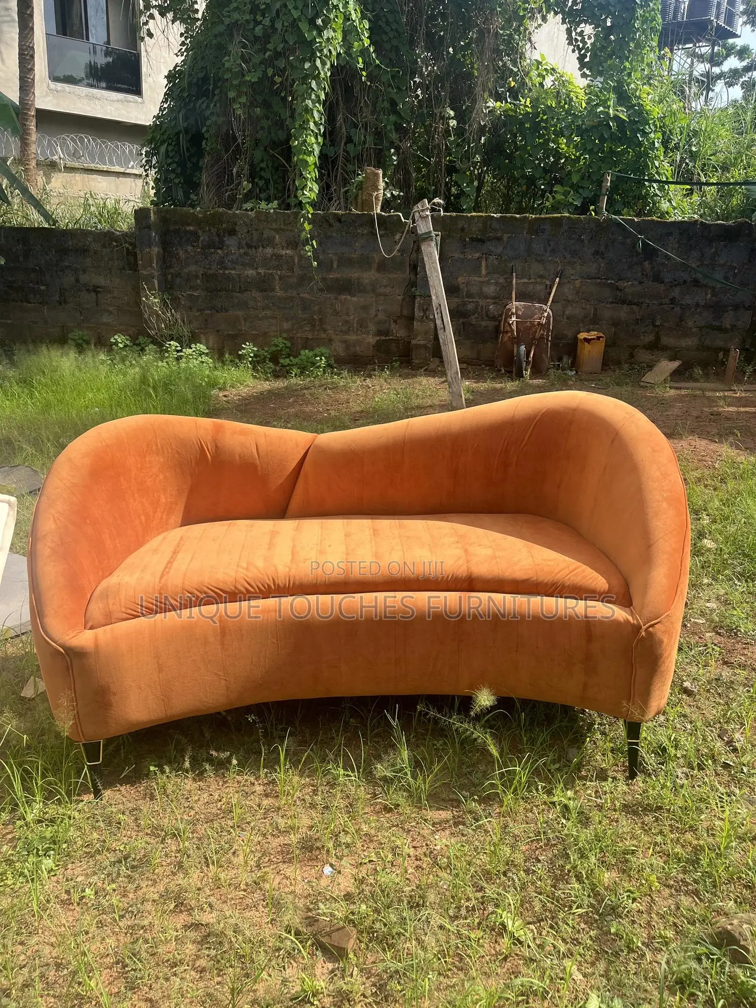 Curvy Orange Sofa for Ante Room