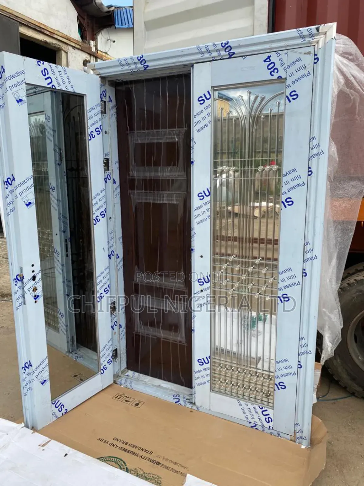 Stainless And Gold Door In Door
