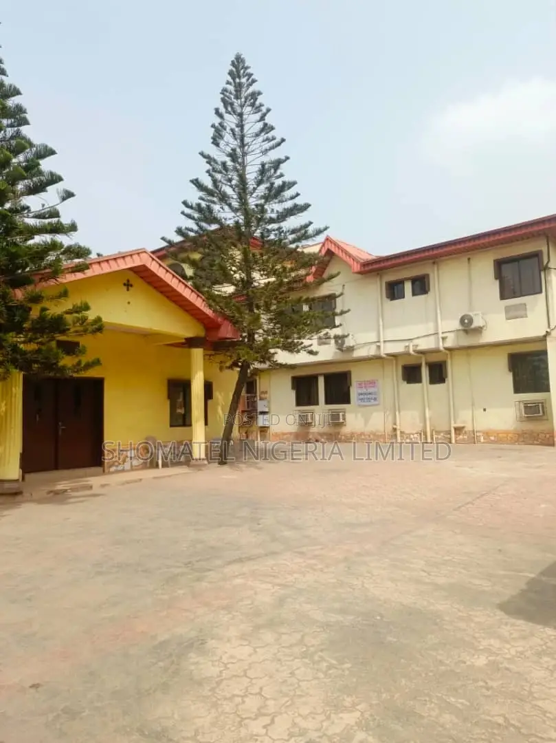 Hotel for Sale at Alakuko Lagos State on a Tiled Road