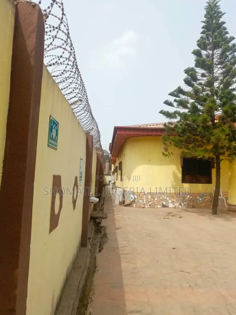 Hotel for Sale at Alakuko Lagos State on a Tiled Road