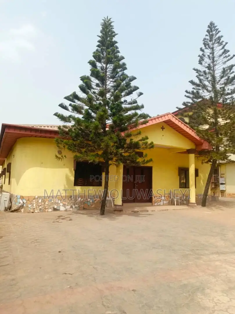 Hotel for Sale at Alakuko Lagos State on a Tiled Road