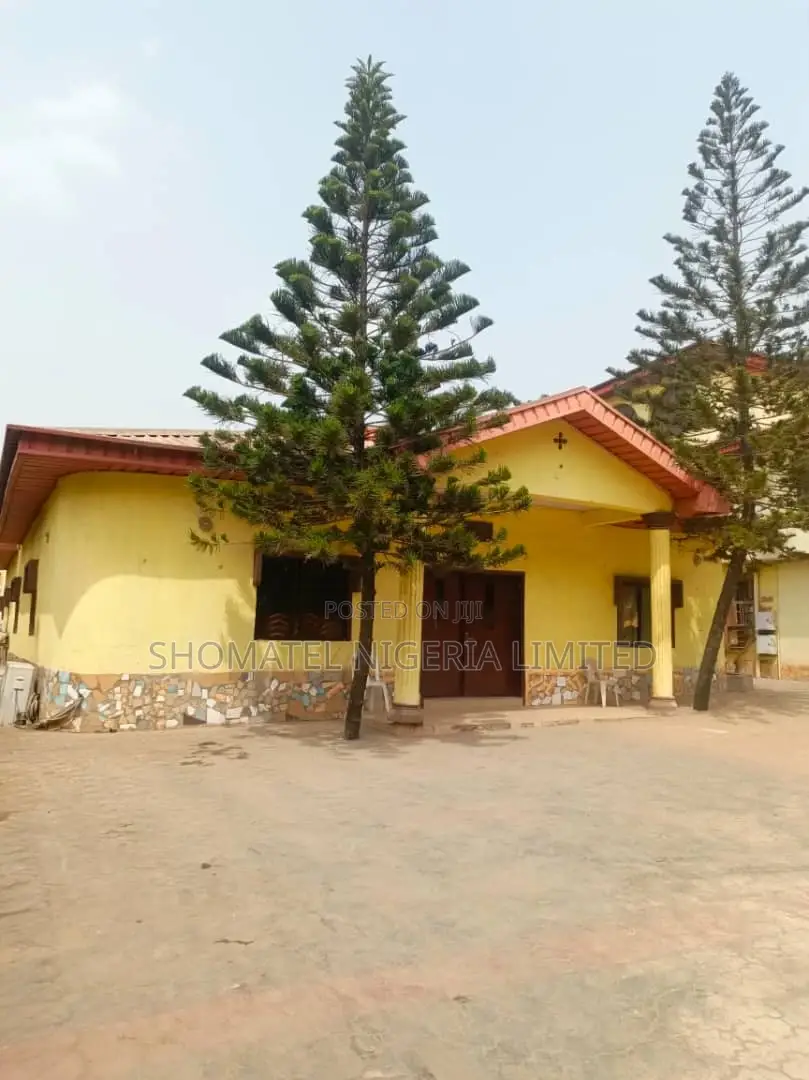 Hotel for Sale at Alakuko Lagos State on a Tiled Road