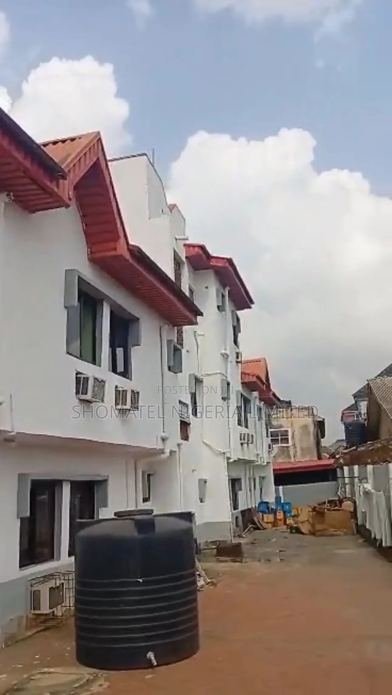 Hotel for Sale at Alakuko Lagos State on a Tiled Road