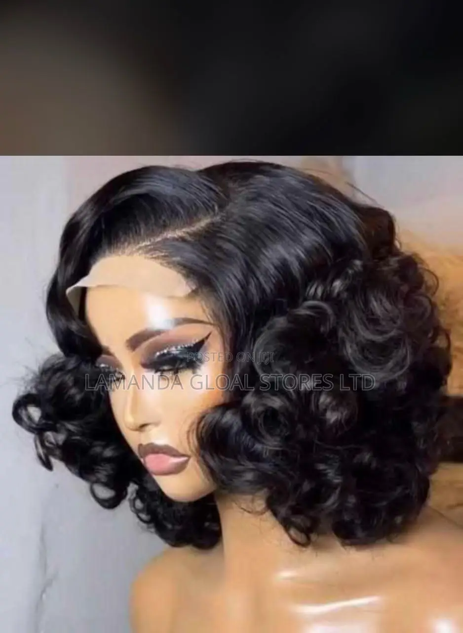 Bouncy Wavy Human Hair 4 by 4 Closure Wig