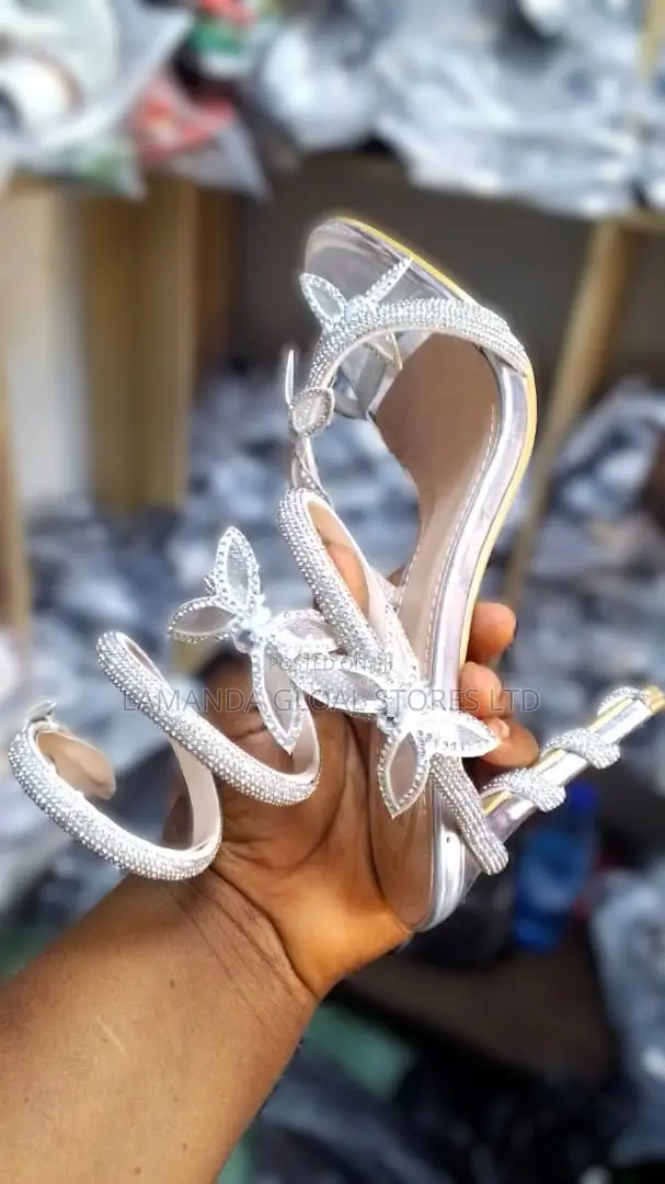 Ladies White Heeled Shoes With Intricate Design
