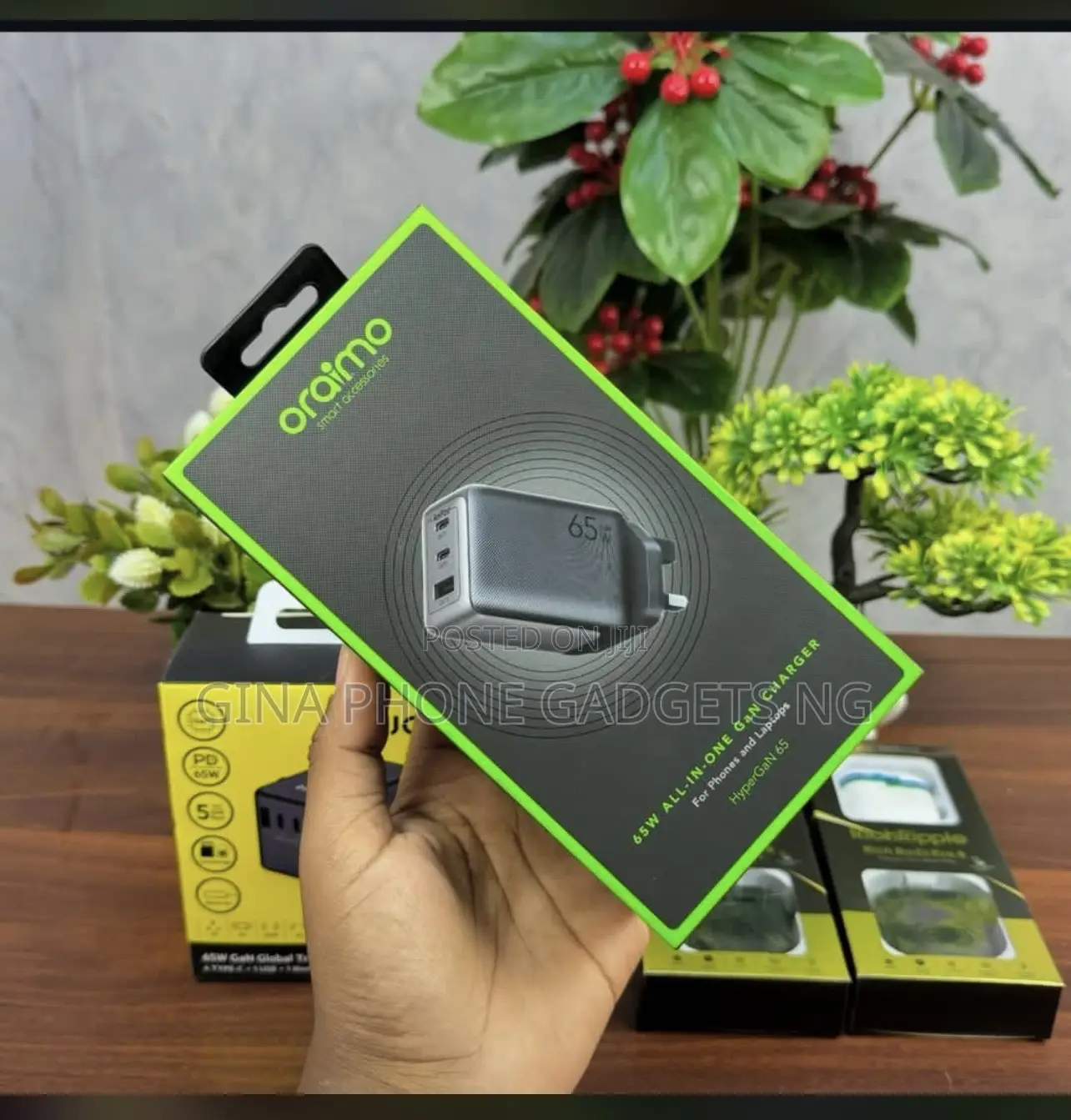 Oraimo 65w All-in-One Gan Charger for Laptop and Phone.