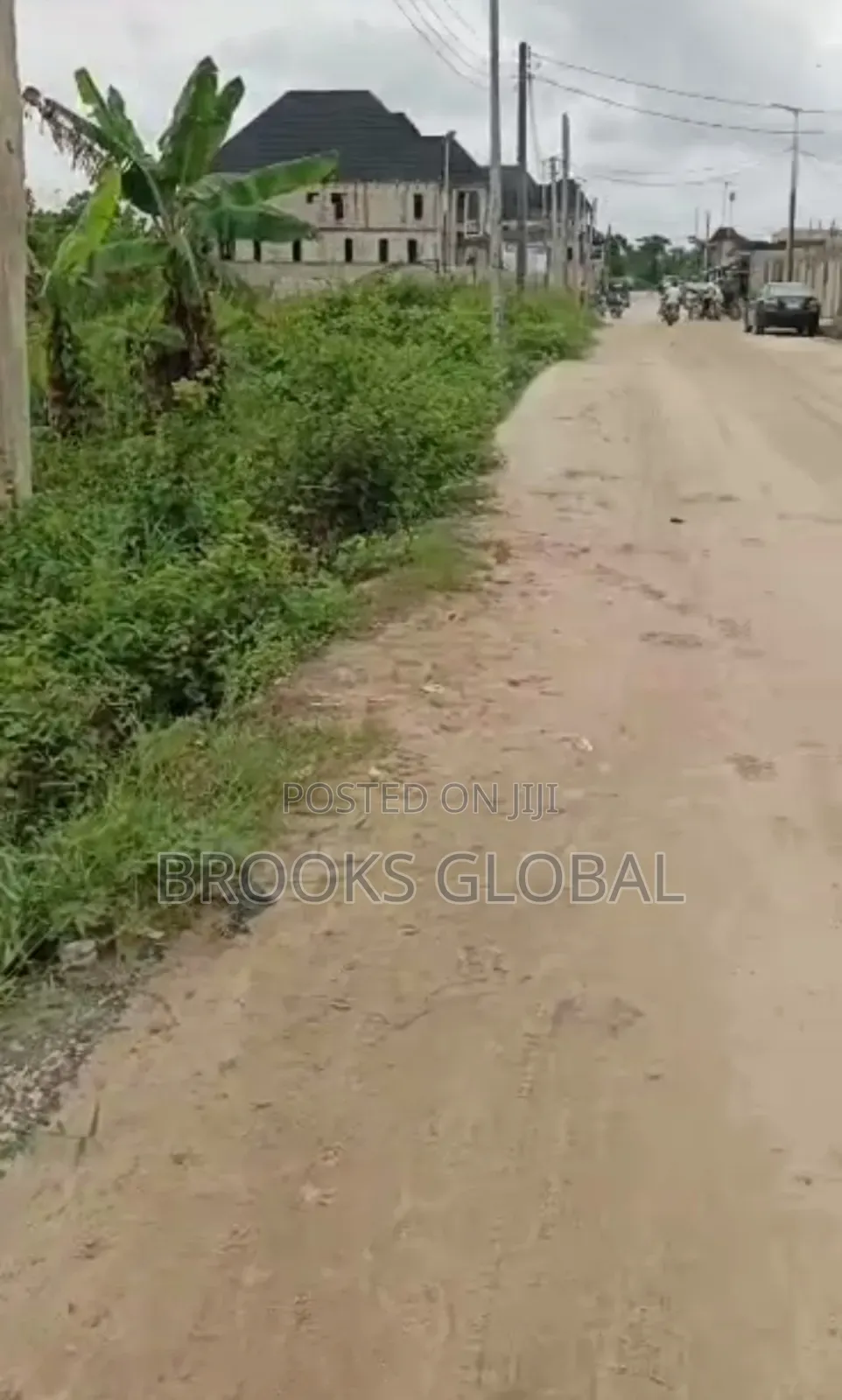 A Land of 100/100 on Tiled Road at Nigercat Warri for Sale