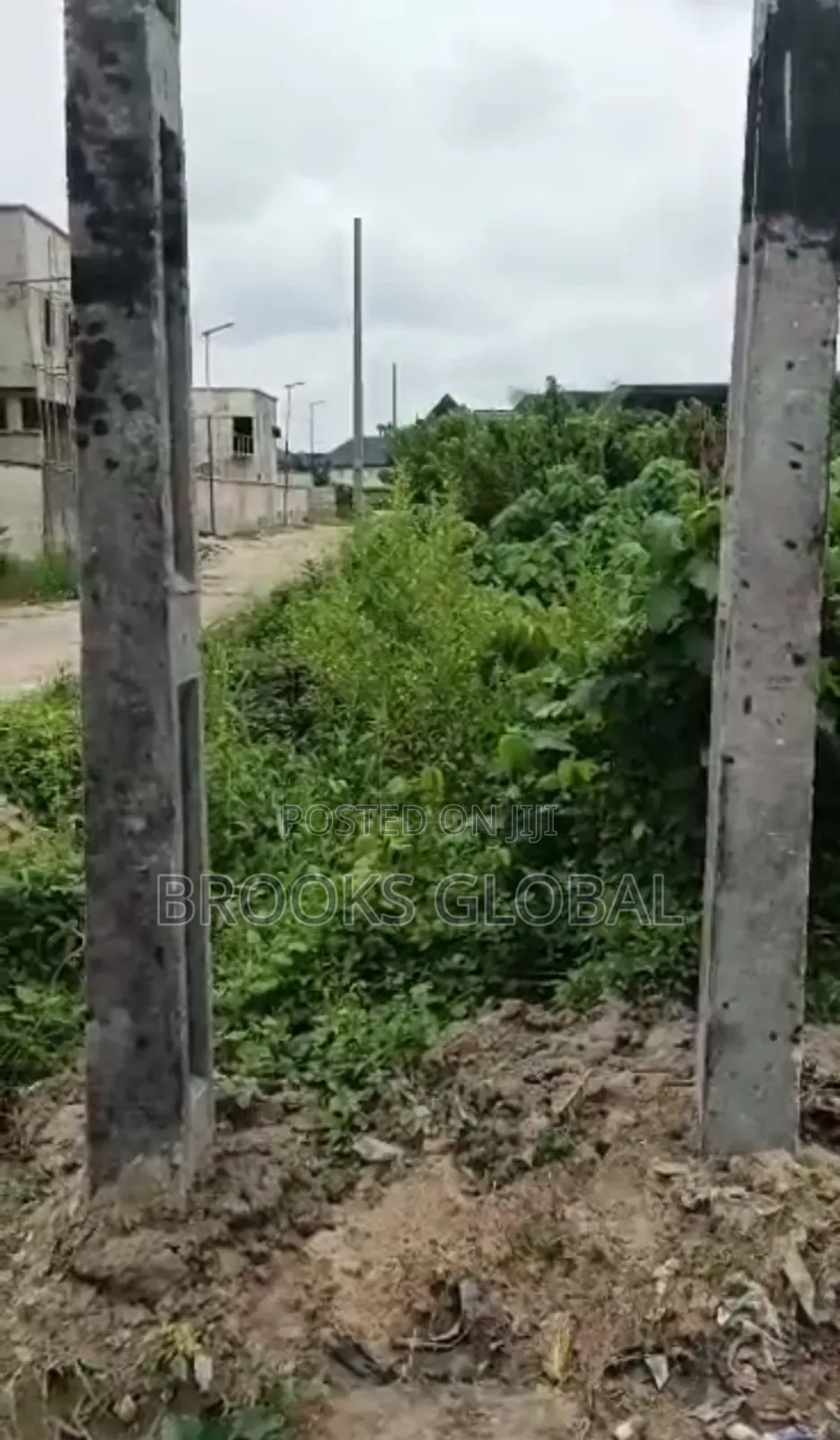 A Land of 100/100 on Tiled Road at Nigercat Warri for Sale