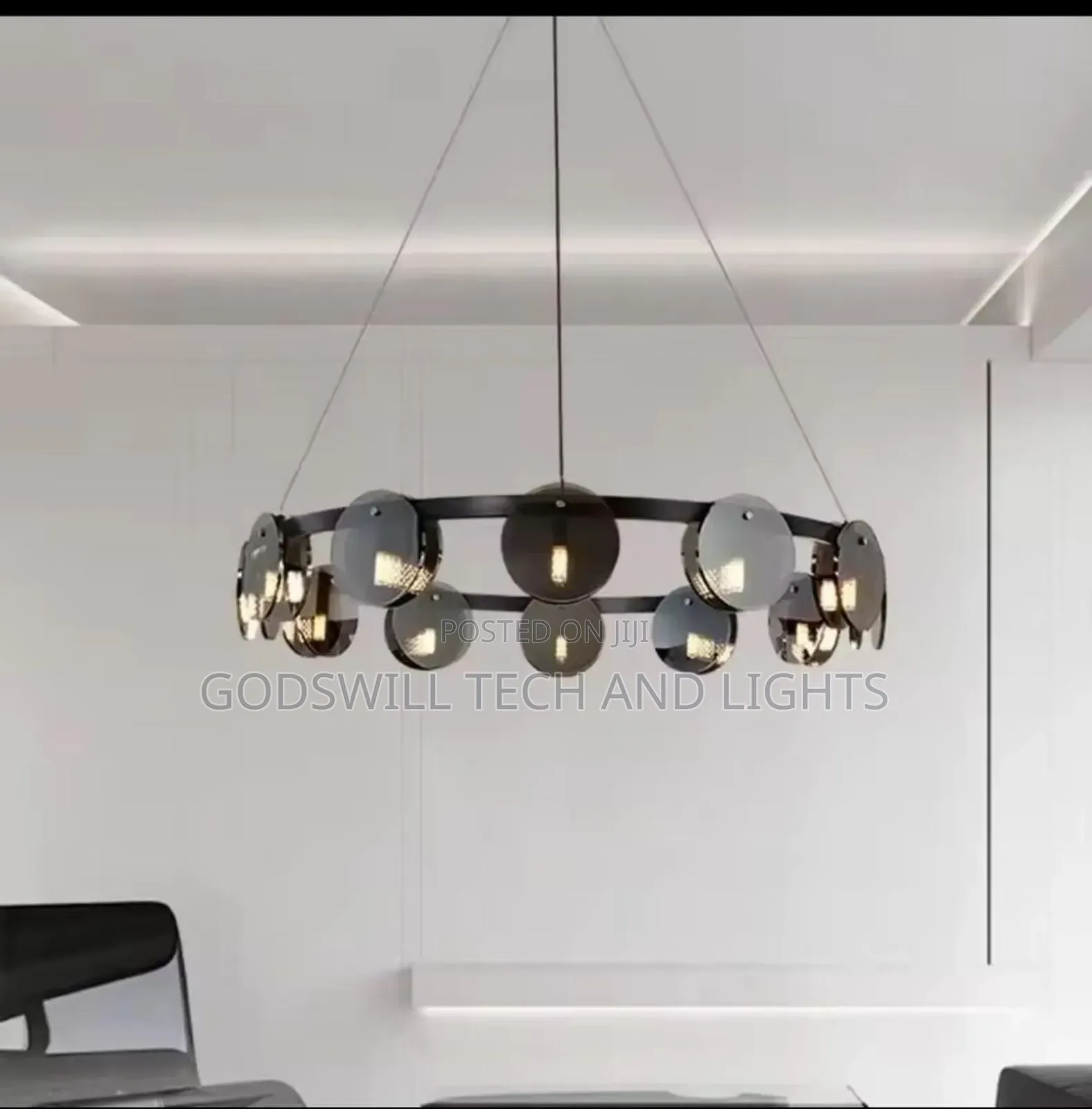 Eclara Round and Chandelier in a Black Finish With Smoked Glass Orbs.