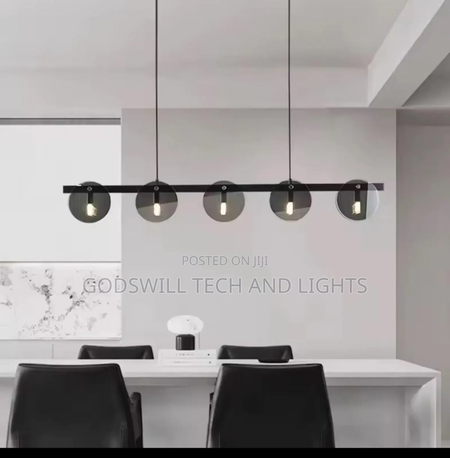 Eclara Round and Chandelier in a Black Finish With Smoked Glass Orbs.