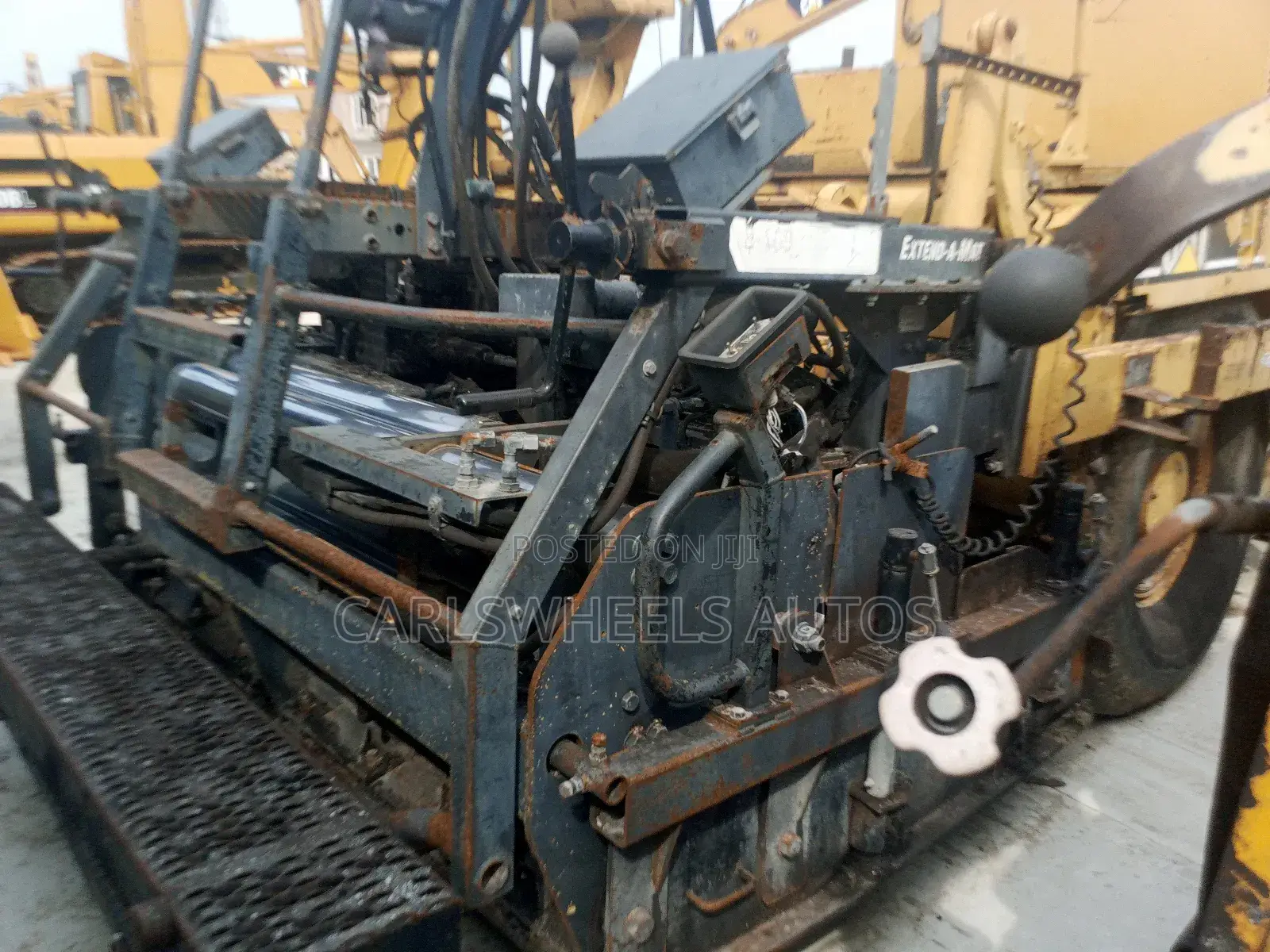 Foreign Used Caterpillar Pv-5 Asphalt Paver.