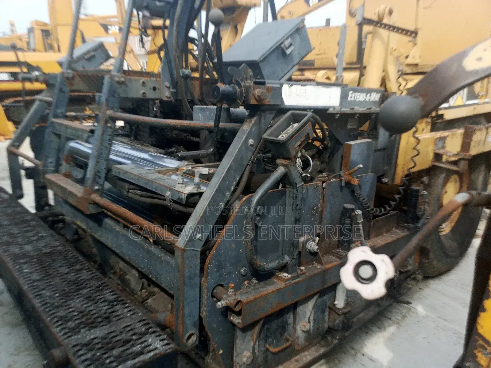 Foreign Used Caterpillar Pv-5 Asphalt Paver.