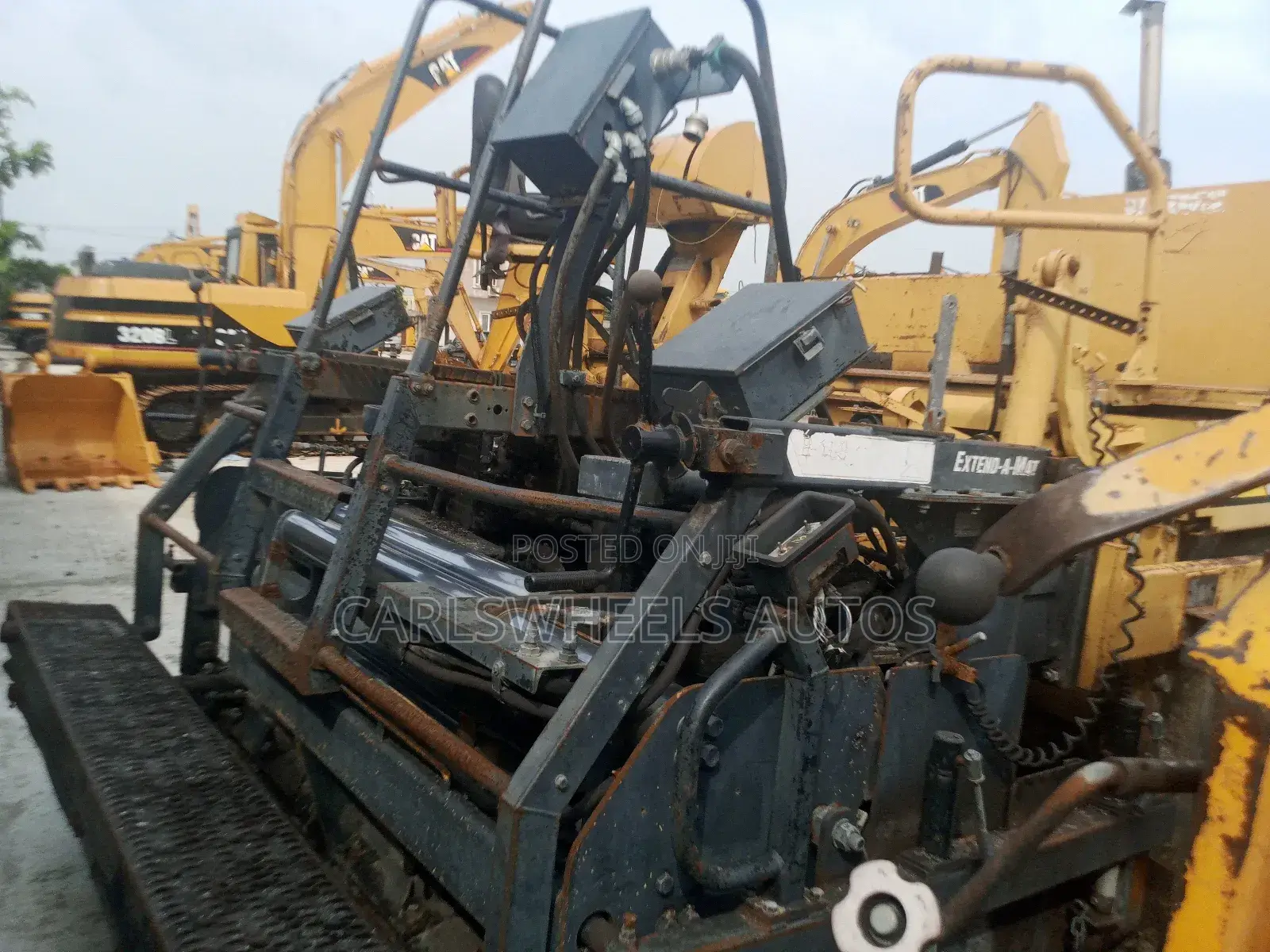 Foreign Used Caterpillar Pv-5 Asphalt Paver.