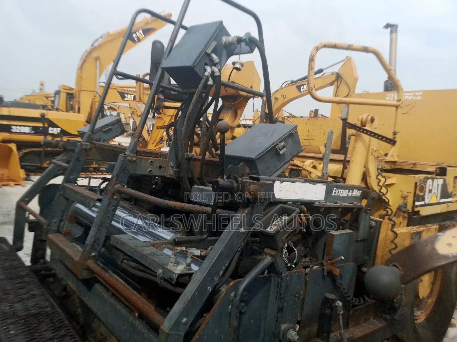 Foreign Used Caterpillar Pv-5 Asphalt Paver.