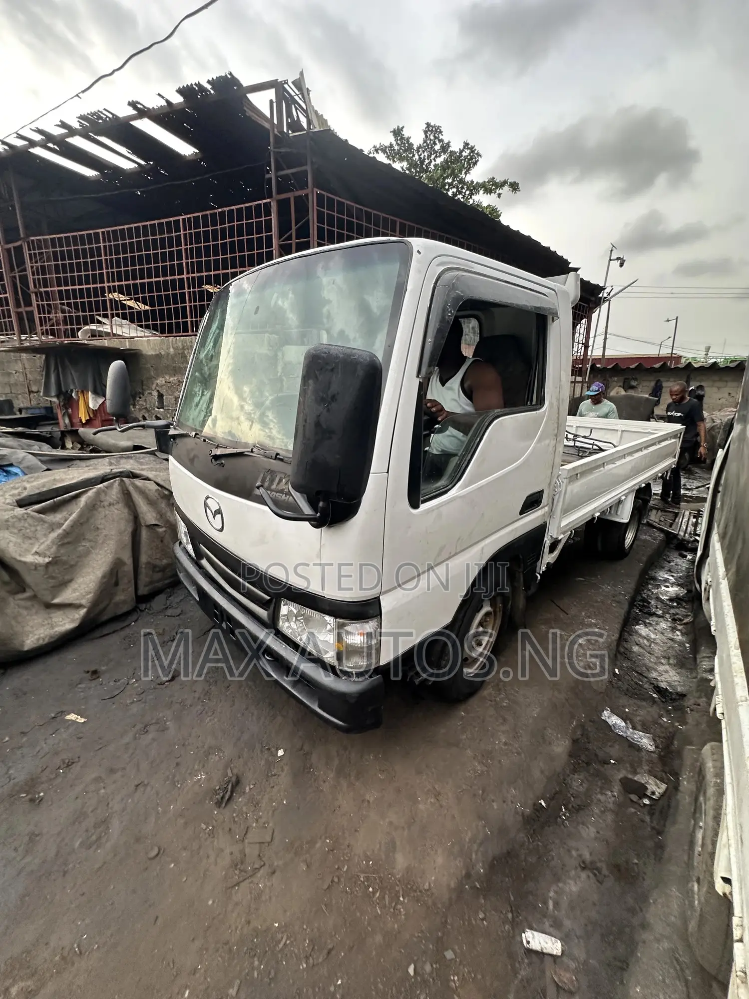Titan Mazda 2011 White