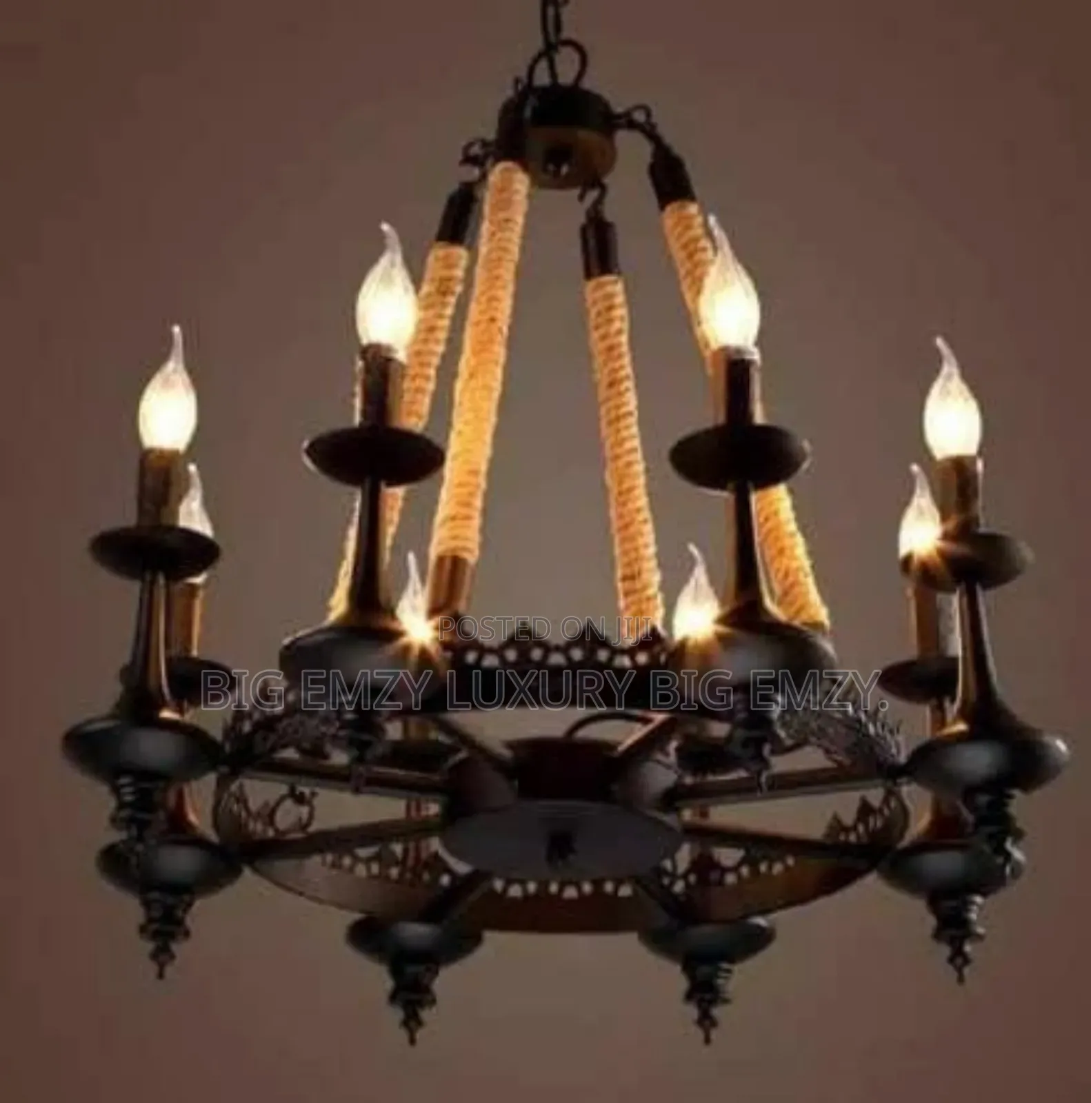 Wagon Wheel Chandelier or a Rustic Metal and Rope Pendant Chandelier.