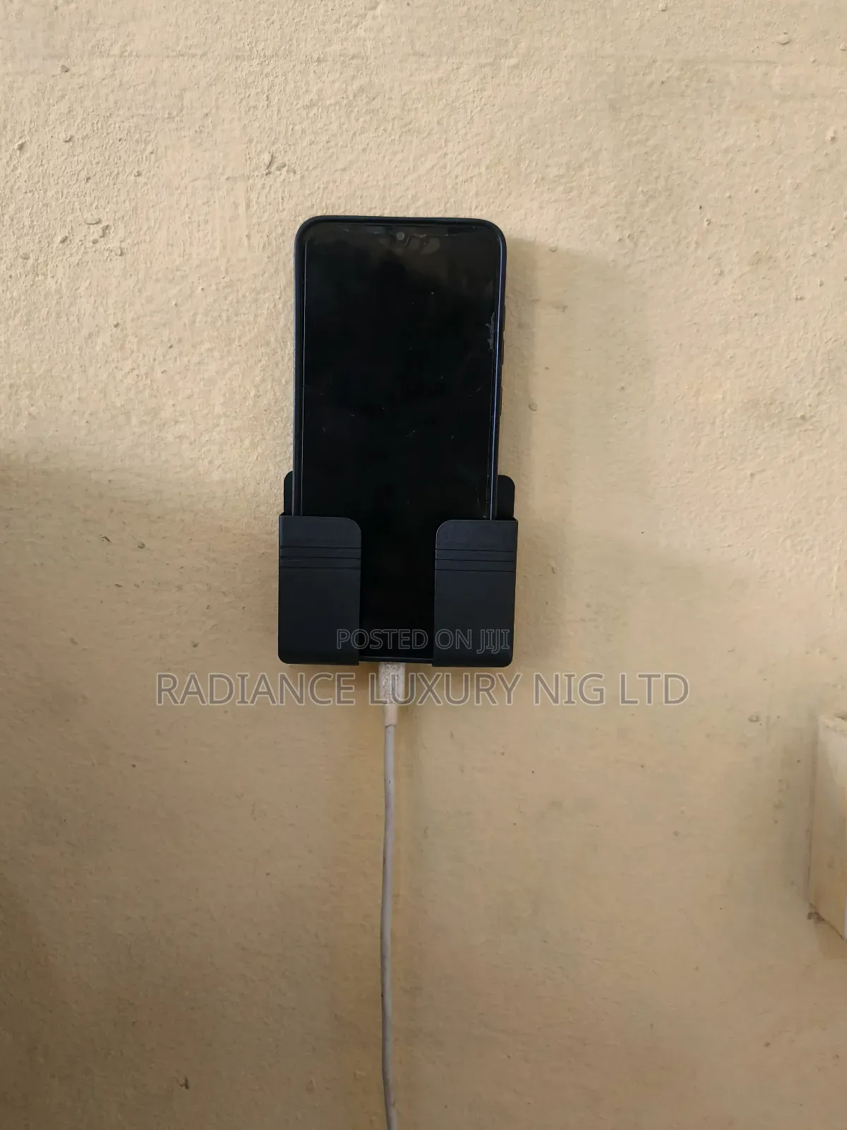 Wall-Mounted Mobile Phone Charging Case Holder