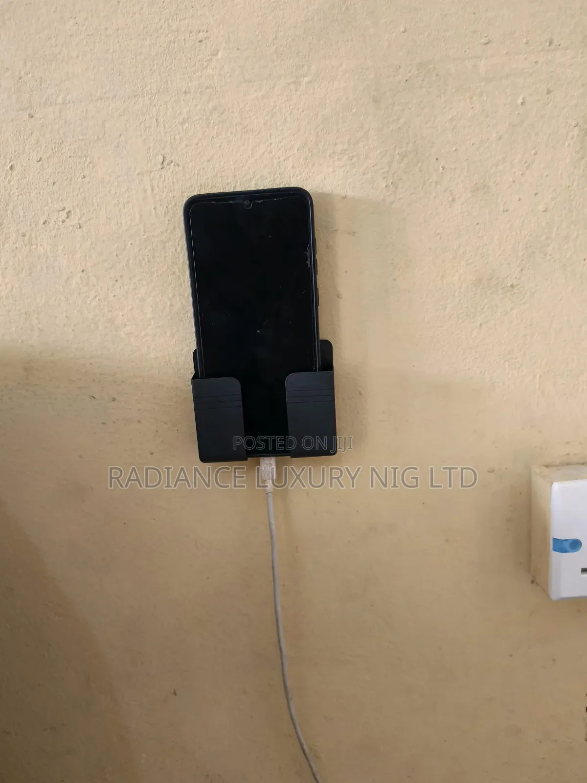 Wall-Mounted Mobile Phone Charging Case Holder