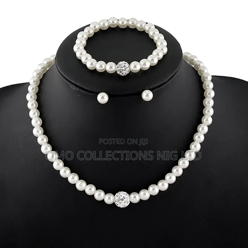Pearl Jewelry Set With Crystal Accents–Necklace, Bracelet and Earrings