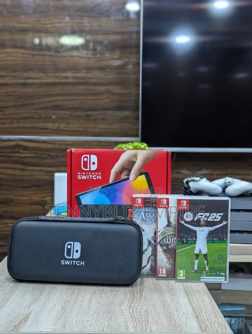 Uk-Used Open-Box Nintendo Switch Oled — Fc25 + Two Disc Games.