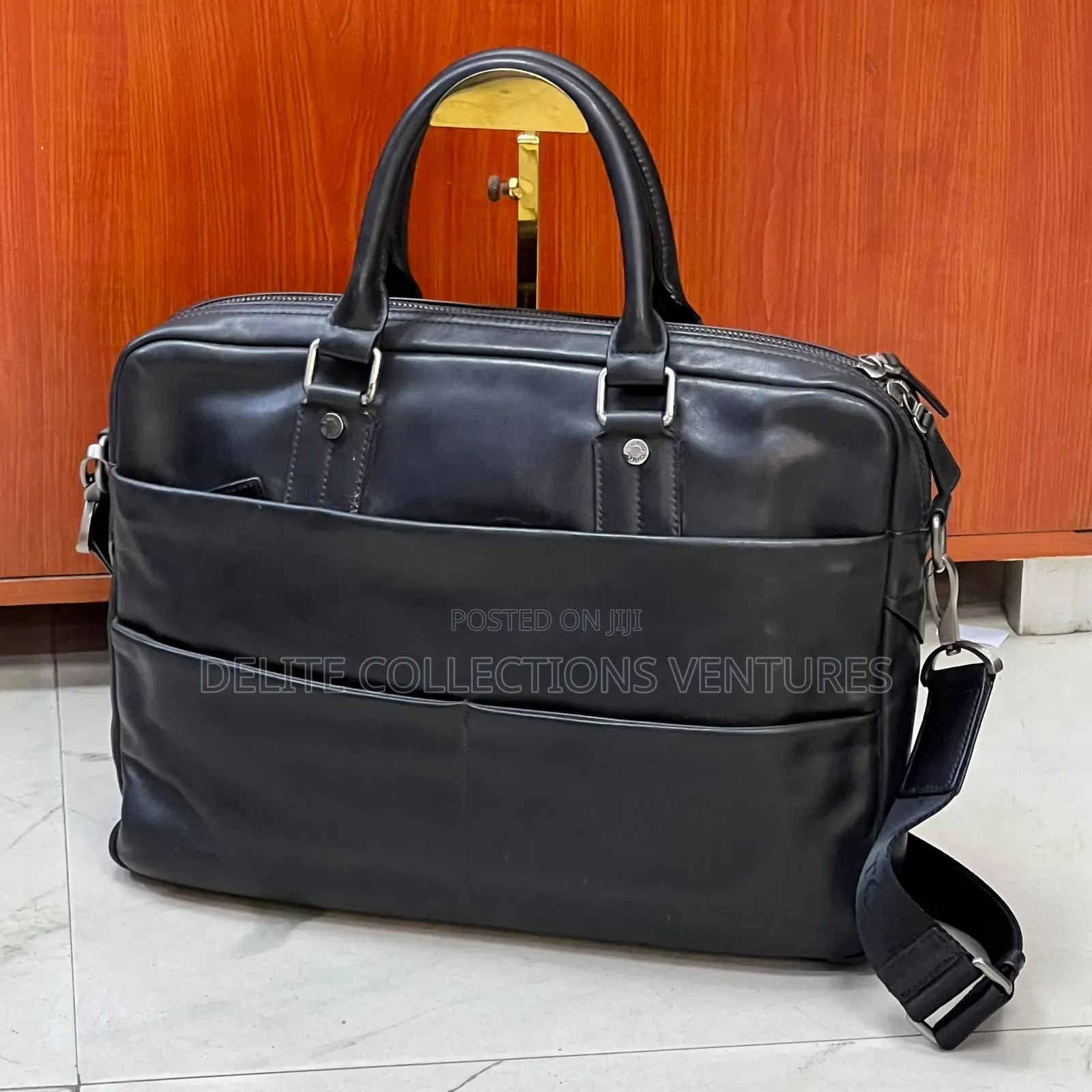 This Is a Black Leather Tommasi Unisex Brief-Bag