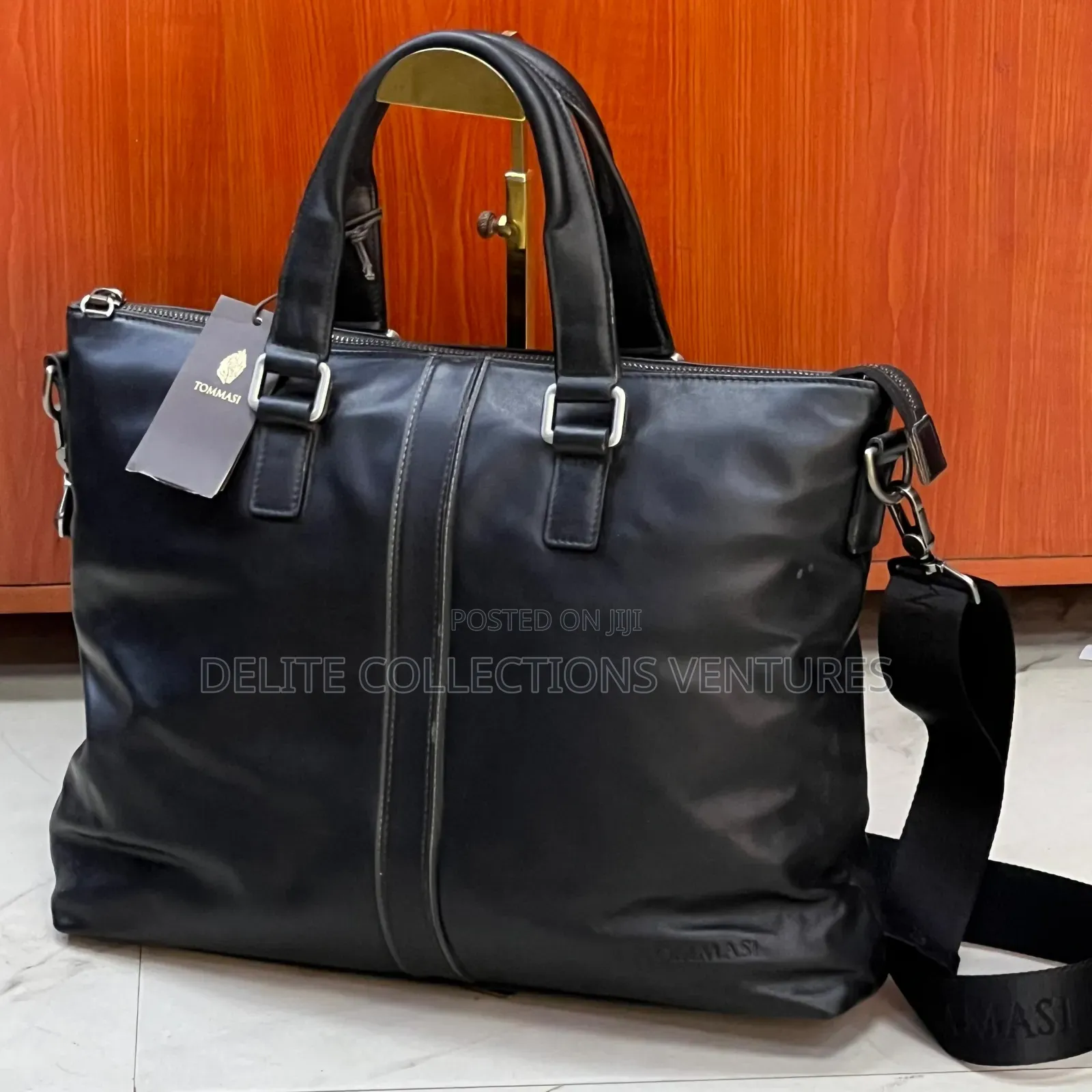This Is a Black Leather Tommasi Unisex Brief-Bag