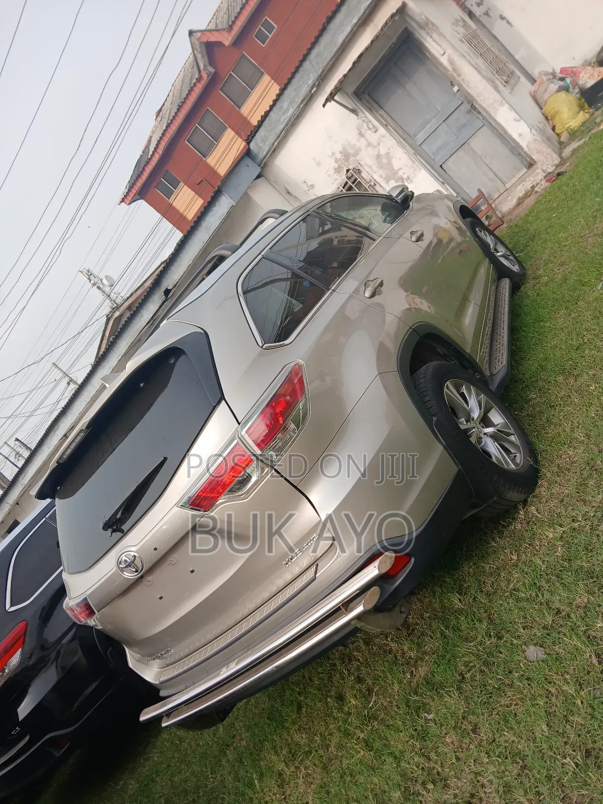 Toyota Highlander XLE 4dr SUV AWD (3.5L 6cyl 6A) 2015 Gold
