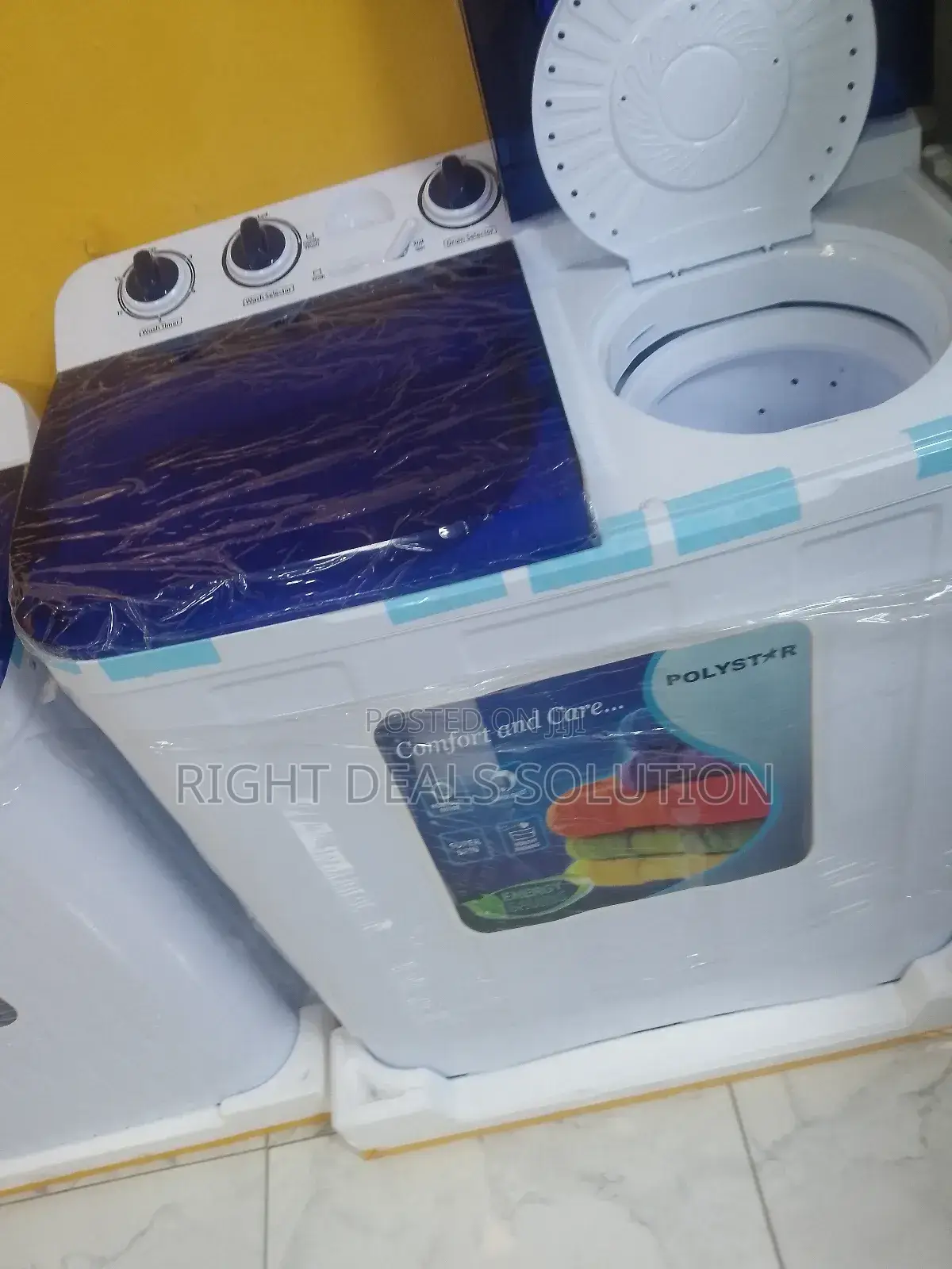 The Straightforward Polystar 10kg Twin Tub Washer.