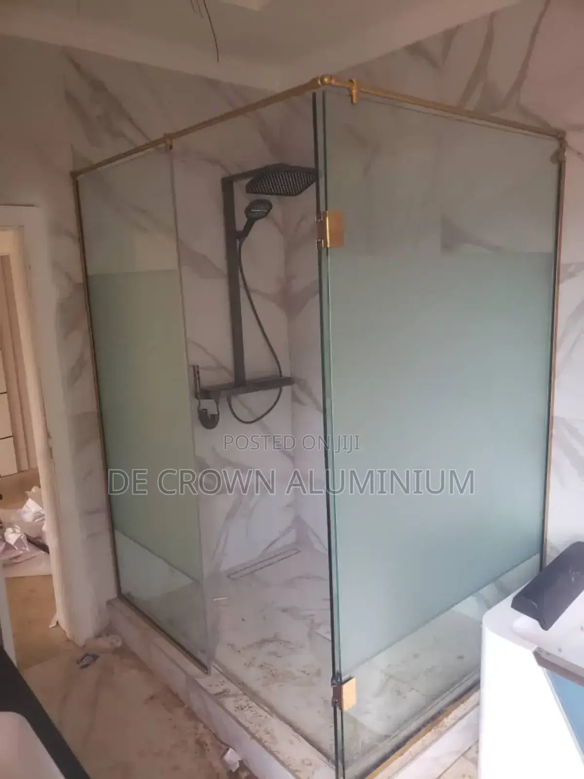Glass Shower Cubicle With Gold Accessories