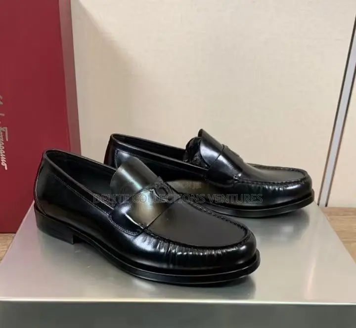Luxury Update  Salvatore Ferragamo Embossed-Gancio Loafers.