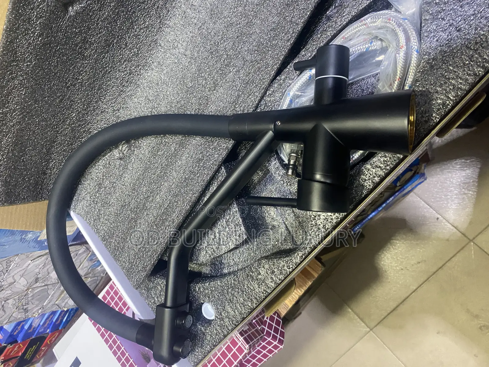 2-in-1or 3-Way Tap With Pull-Down Sprayer and a Black Flexible Spout.