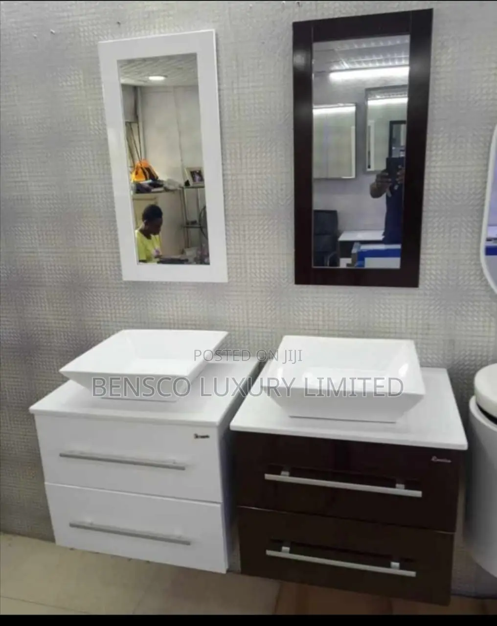 A Wall Mounted Bathroom Vanity Unit With a Countertop Basin