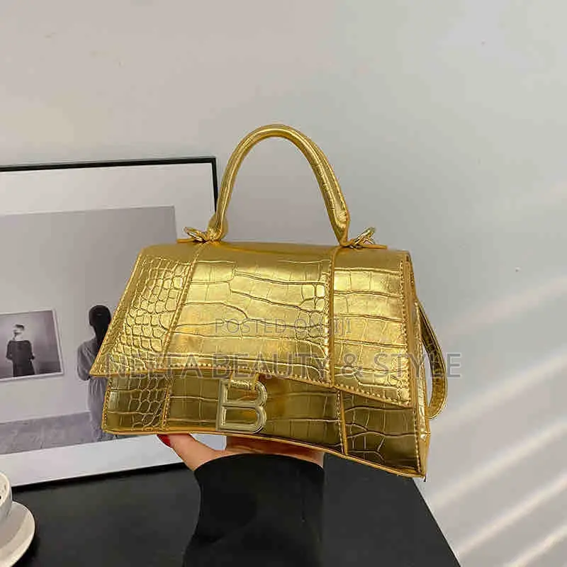 Balenciaga Hourglass Top-Handle Bag.