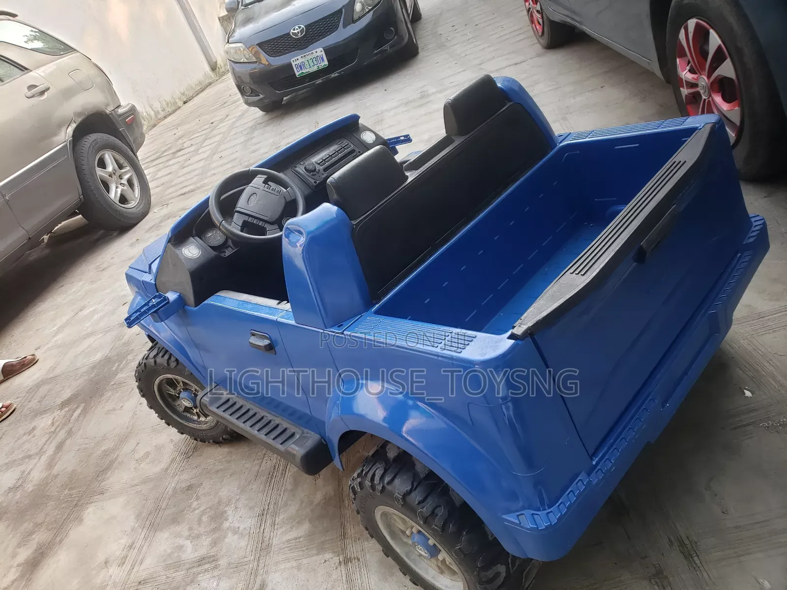 Blue Ford Ride-on Truck