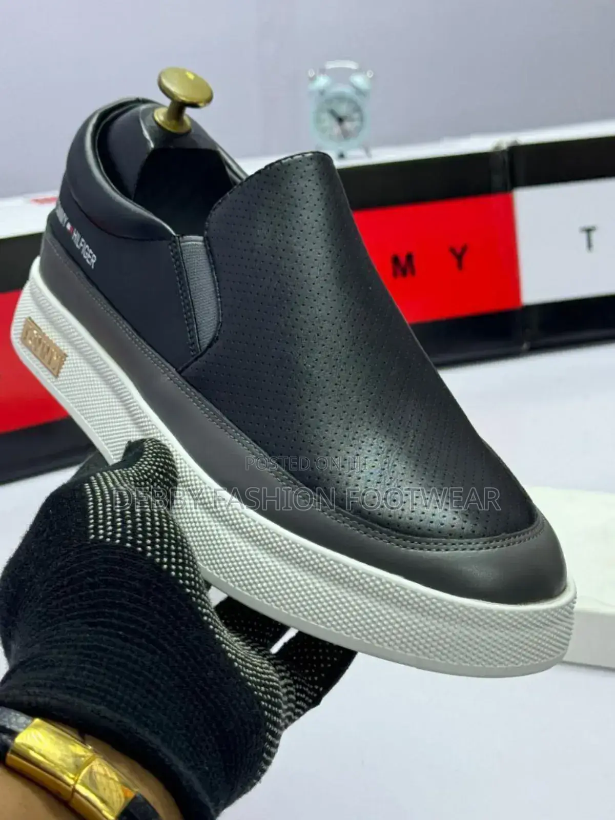 Elevate Your Style With This Classy Pair of Tommy Premium Shoes