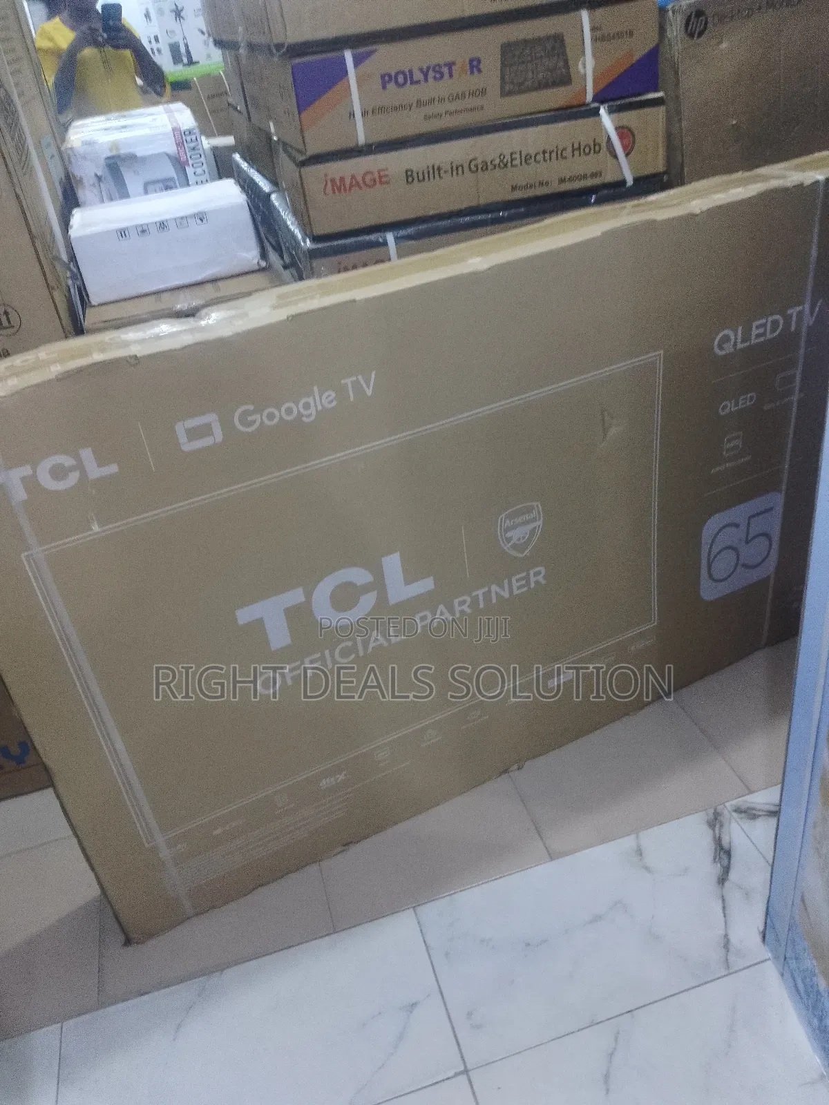 Experience Cinematic Brilliance: TCL 65" Qled Smart Tv